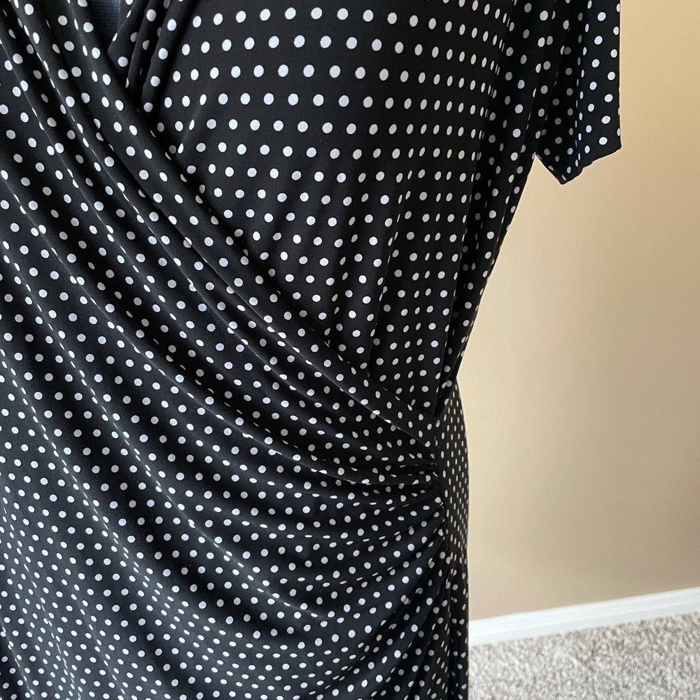 Faux wrap dress in mini black and white polka dots